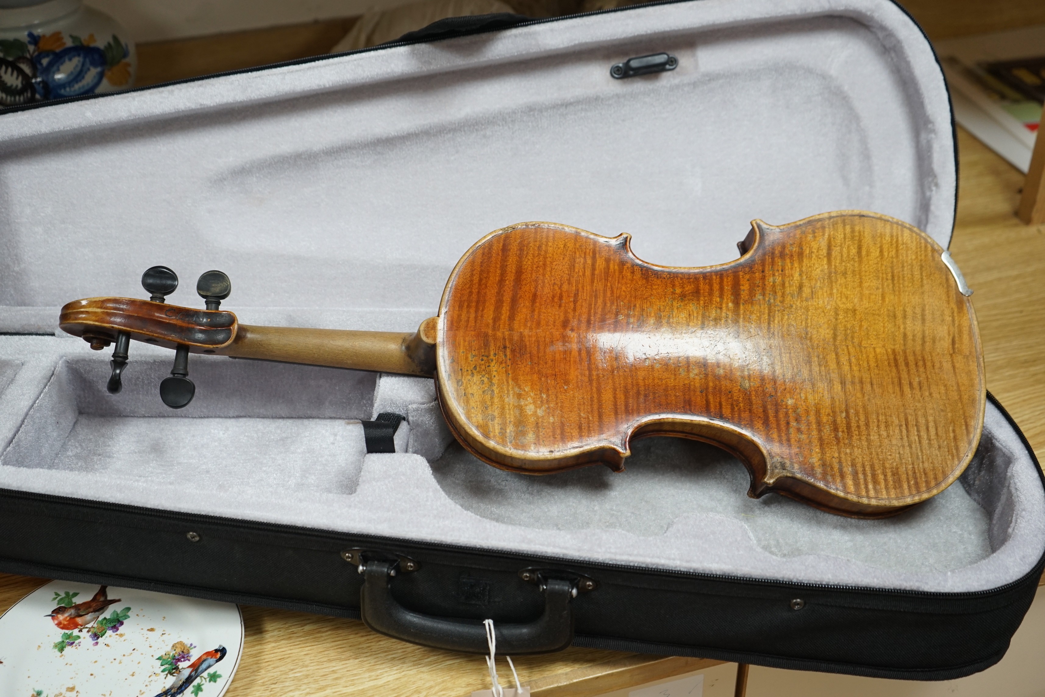 A late 19th century German violin, bears fake Stradivarius label, cased